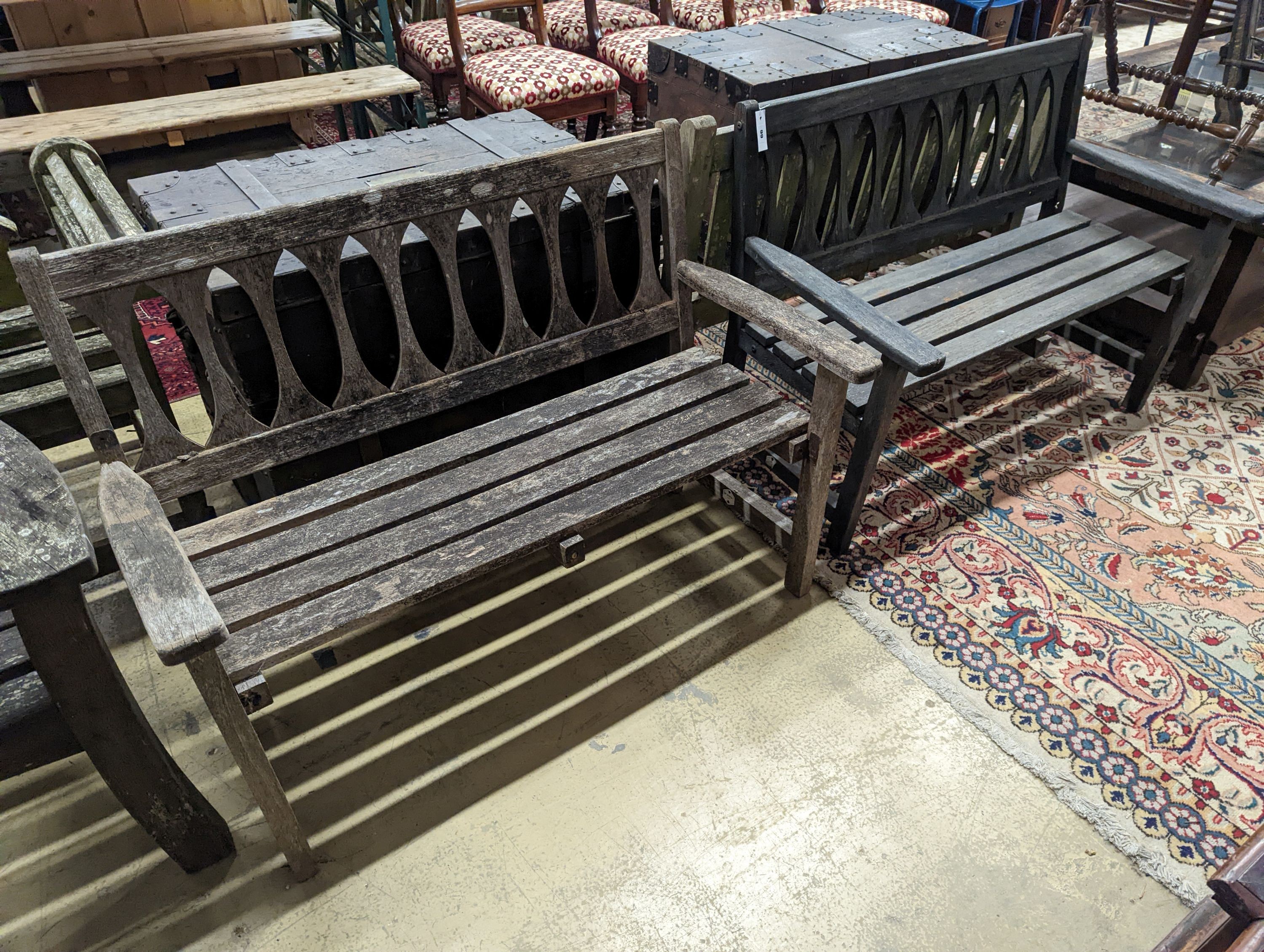 A pair of weathered teak garden benches, length 110cm, depth 50cm, height 83cm